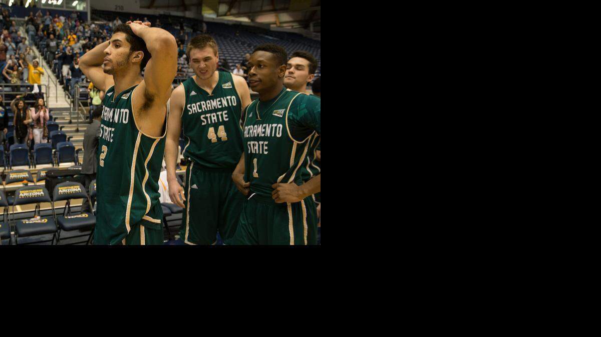 
Sac State Hornets guard Cody Demps (2), center Eric Stuteville (44) and guard Dreon Barlett (1) leave the floor after the team’s 70-68 loss to the Northern Arizona Lumberjacks on Saturday, March 7, 2015, at Walkup Skydome in Flagstaff, Arizona.

