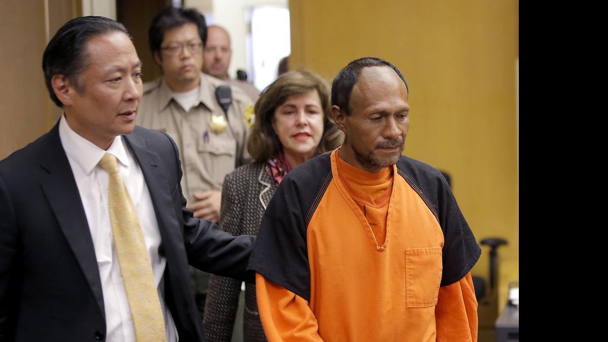 
 Juan Francisco Lopez Sanchez, right, is led into the courtroom July 7 by San Francisco Public Defender Jeff Adachi, left, and Assistant District Attorney Diana Garciaor, center, for his arraignment at the Hall of Justice in San Francisco in the shooting death of Kathryn Steinle. Steinle, 32, was fatally shot while walking on a San Francisco pier, and authorities arrested suspect Sanchez, who was released from jail in April even though immigration officials had lodged a detainer to try to deport him from the country for a sixth time. 
