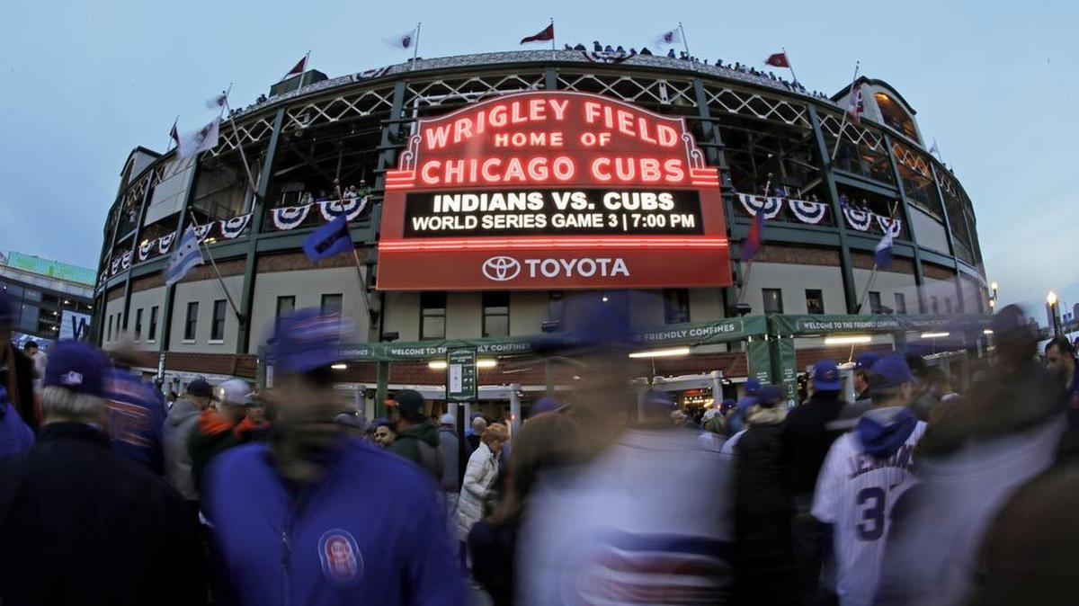Fans arrive Friday at Chicago’s Wrigley Field for Game 3 of the World Series between the Chicago Cubs and the Cleveland Indians, who won 1-0.