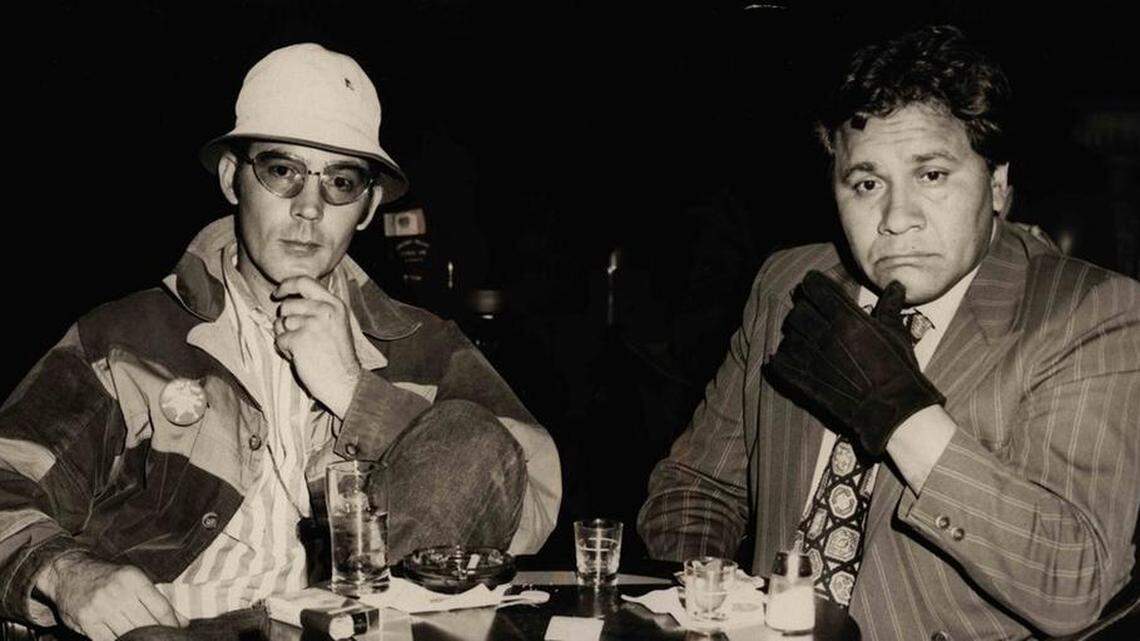 Hunter S. Thompson and Oscar Acosta (right).