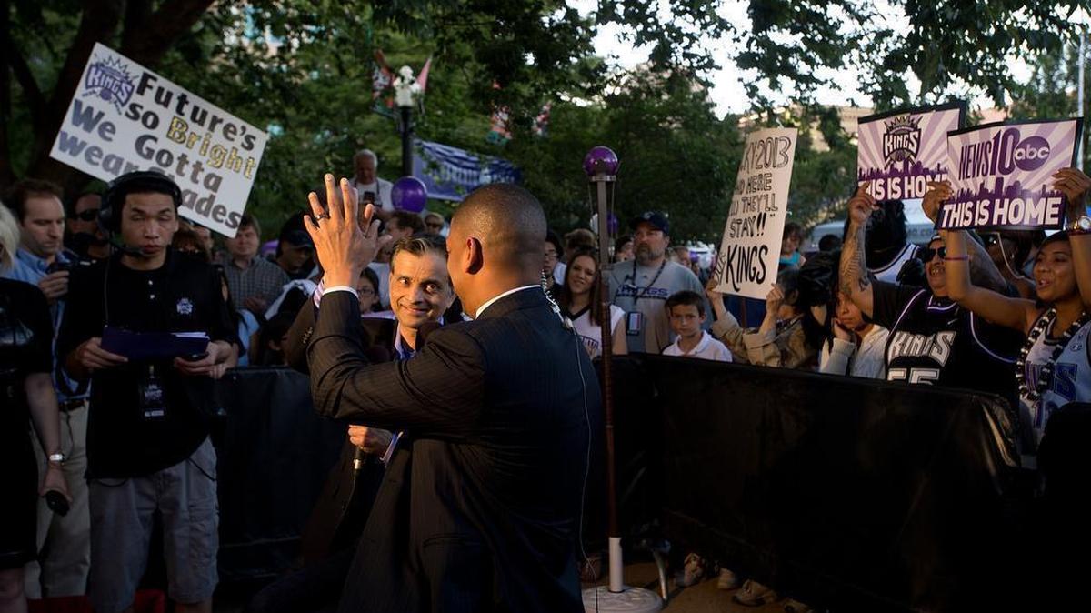 
Sacramento Kings owner Vivek Ranadive and Sacramento Mayor Kevin Johnson trade high-fives after an ESPN interview at a Sacramento Kings rally in May 2013.
