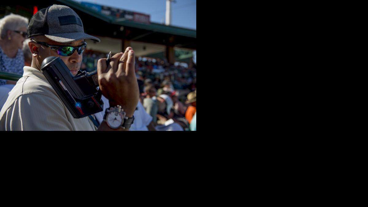 
Jalal Leach is away from his West Sac home 20 nights a month during the season scouting the Giants, Twins and Reds. 
