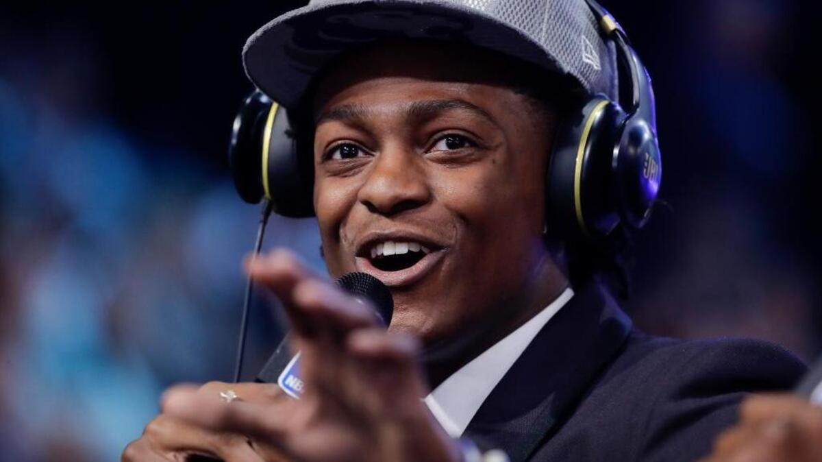 De’Aaron Fox answers questions during an interview after being selected by the Sacramento Kings as the fifth pick overall during the NBA basketball draft.