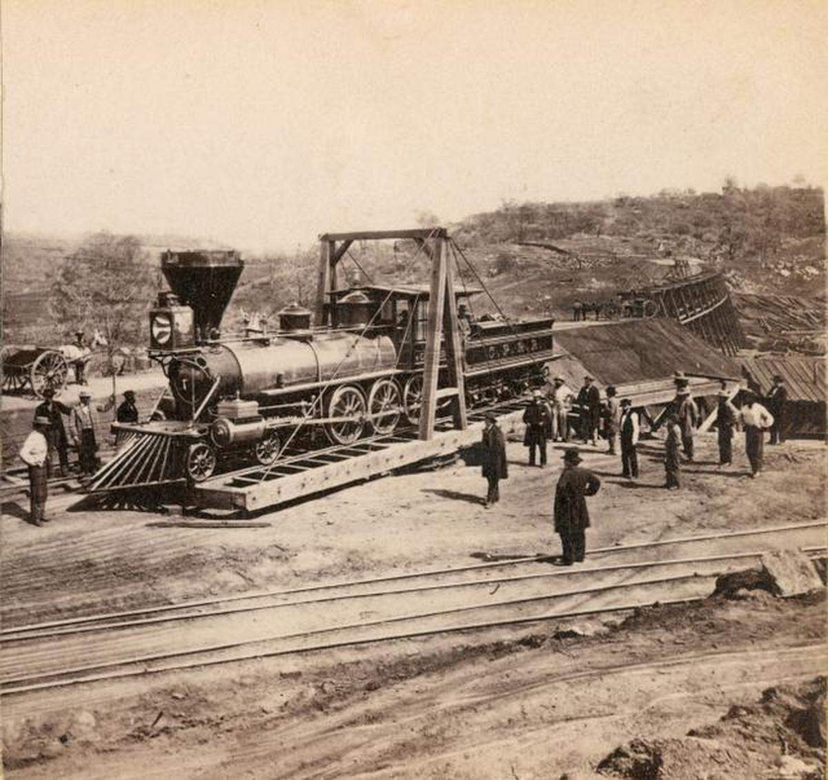 Locomotive on Turntable“Building the Central Pacific Railroad: A Photographic Journey,” a presentation at the California State Library on Wednesday, Jan. 14, 2015. From 1864 to 1869, Alfred A. Hart, the railroad’s official photographer, recorded the progress of the railway’s construction from Sacramento, over the Sierra Nevada range, across Nevada to Promontory, Utah, using a 5-by-8 inch wet-plate stereo camera and processing his fragile glass plates in a portable dark tent. A special viewing takes place at 6 p.m. at the Stanley Mosk Library and Courts Building, 914 Capitol Mall in Sacramento. The event is free. 