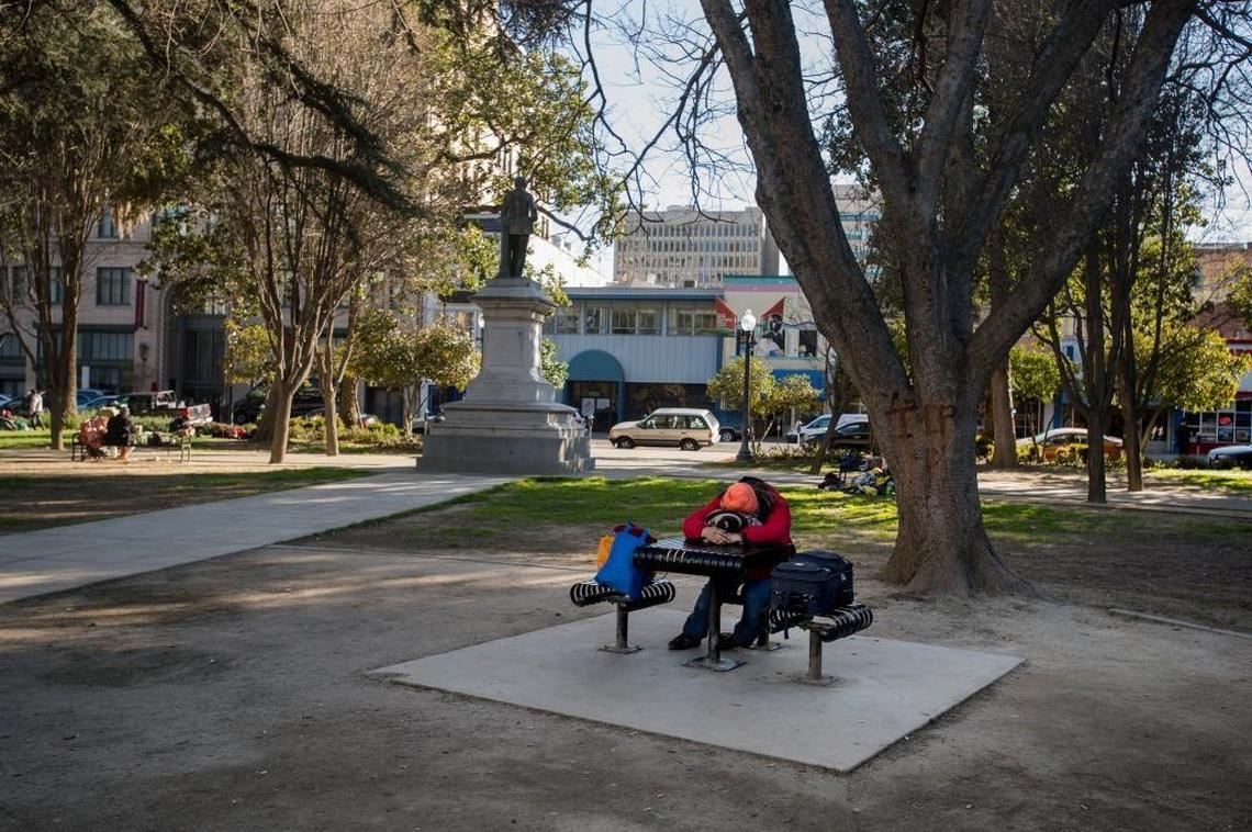 A homeless person in Cesar Chavez Plaza on March 2, 2017.