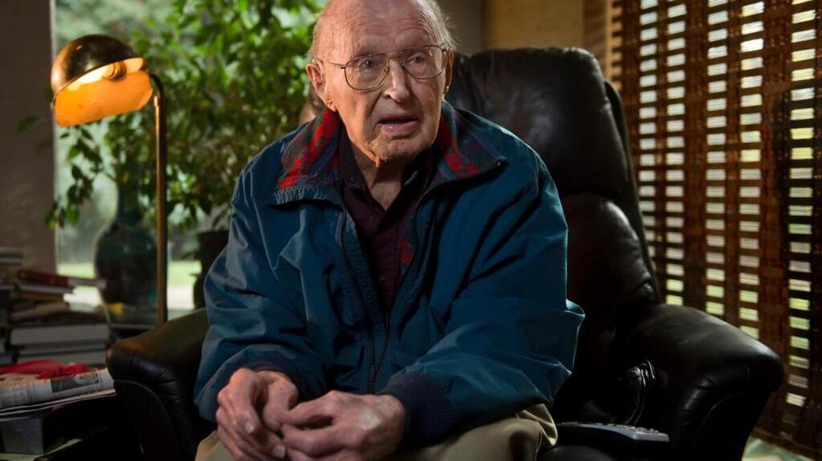 
Pearl Harbor veteran Glenn Sorensen reminisces about his experience during World War II at his home in Sacramento late last year. 
