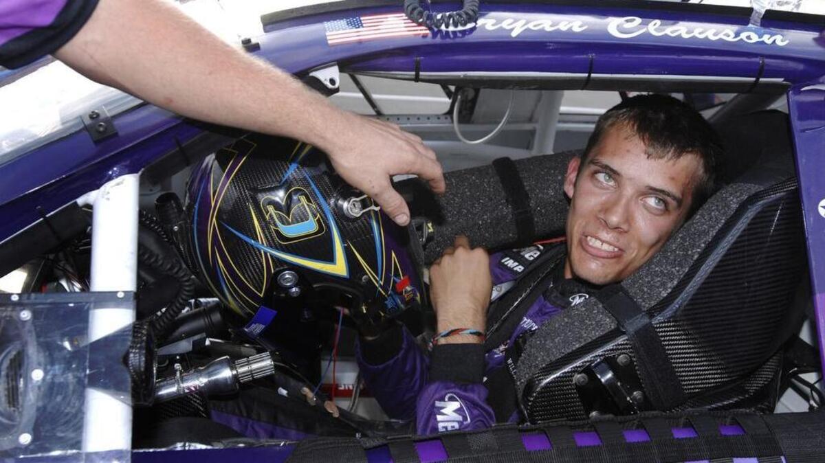 FILE - In this Oct. 4, 2007, file photo, Bryan Clauson smiles in his car during qualifying for the ARCA RE/MAX Series 250 auto race, at Talladega Superspeedway in Talladega, Ala.