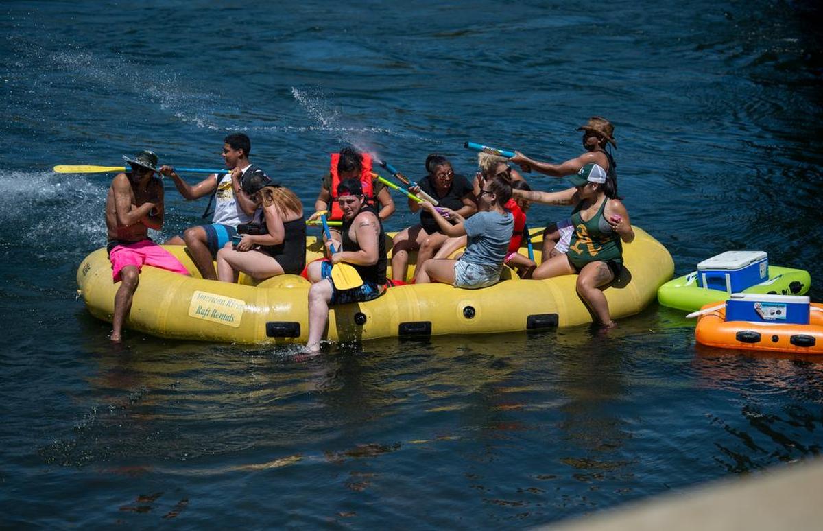 Rafters enjoy the cool weather at the American River on Saturday, July 11, 2015, in Rancho Cordova.