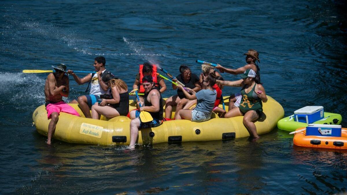Rafters enjoy the American River near Rancho Cordova in 2015. Heavy winter snowfall in the Sierra Nevada mountains has created ideal rafting conditions on the river this year.
