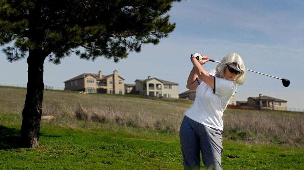 Jamie Brockardt of Fair Oaks takes on the sixth hole at the now-closed El Dorado Hills Golf Course in 2002. The site’s owner sees it as part of a future planned community.