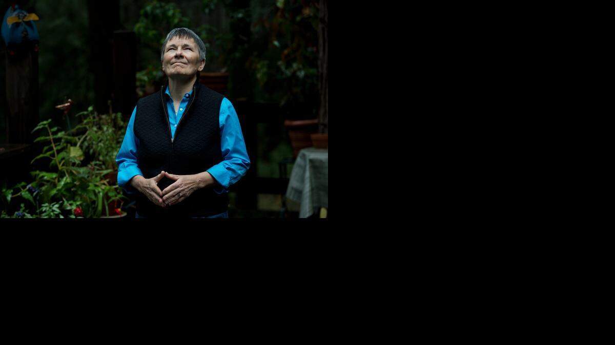 Rosemary Metrailer  stands on the deck outside her home near Nevada City . In the 1980s, she won a lawsuit against the Rev. Jerry Falwell and forced McClellan Air Force Base to give women civilian employees  the same raises as men.