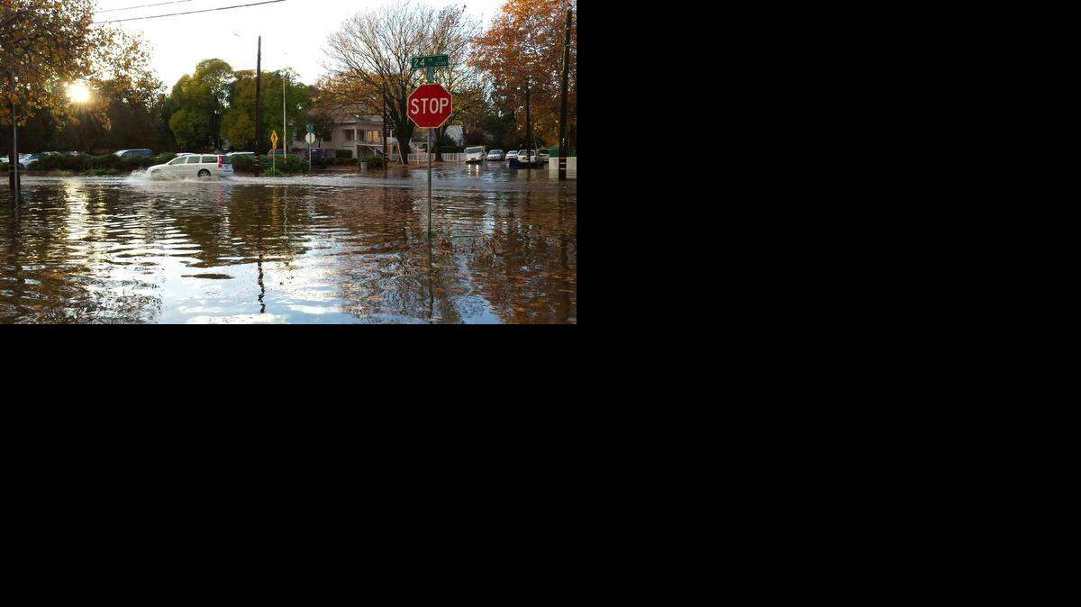 Streets were flooded across the Sacramento region as a second day of rain battered the area on Wednesday, December 3, 2014. This photo is from the Curtis Park neighborhood.