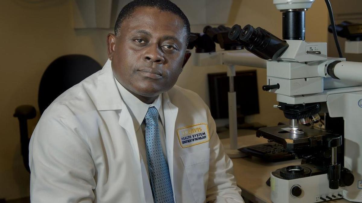 Dr. Bennet Omalu, a volunteer associate clinical professor at the UC Davis, resigned Dec. 5 as chief medical examiner of San Joaquin County. He says the sheriff, Steve Moore, interfered in three forensic investigations to protect cops under scrutiny for the deaths of suspects.