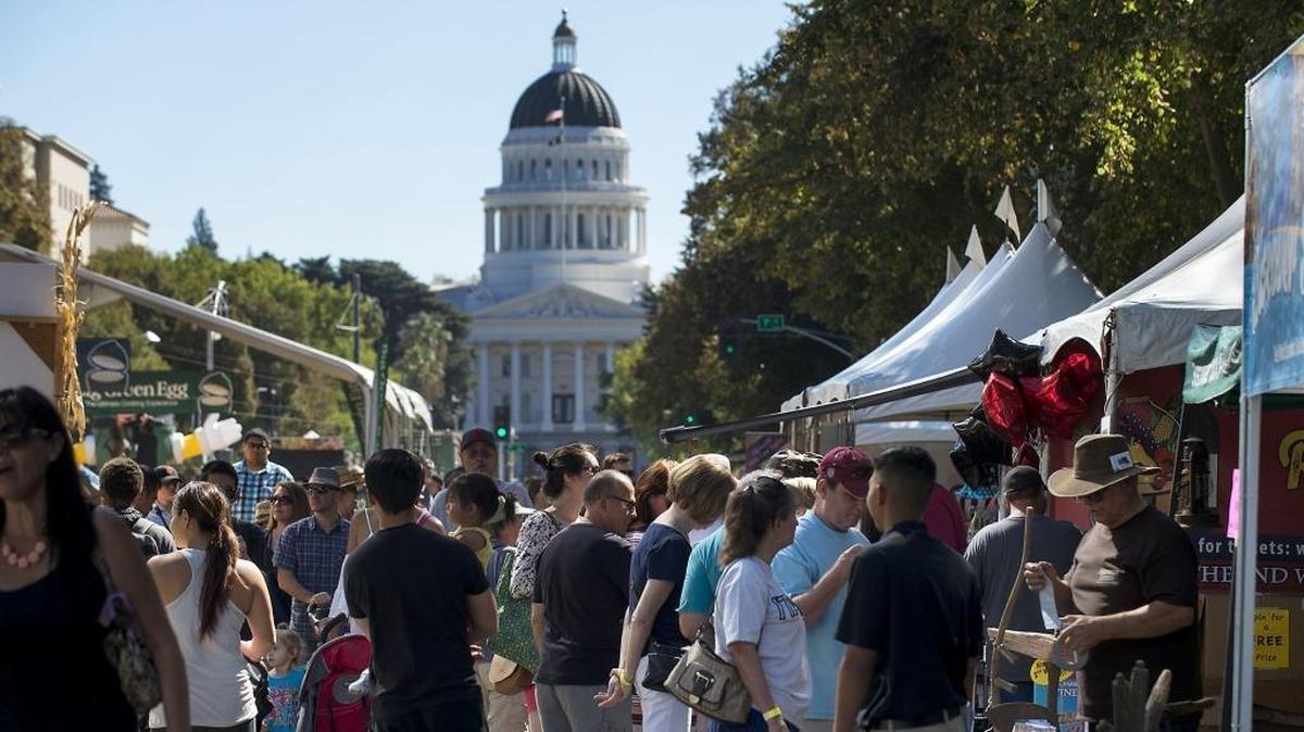 Visitors crowd the roadway during the Farm-to-Fork Festival in Sacramento in September 2015.