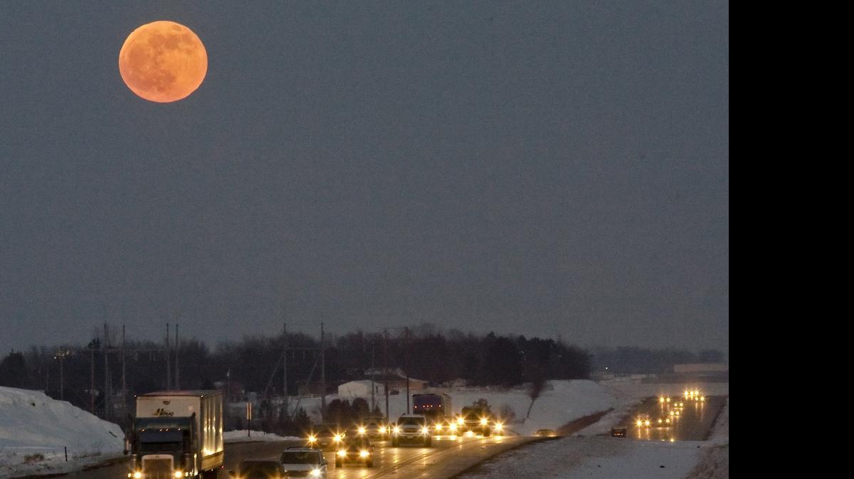 
A blue moon (looking rather orange) was photographed on Dec. 31, 2009, in Nebraska. The second full moon in a calendar month is called a blue moon.
