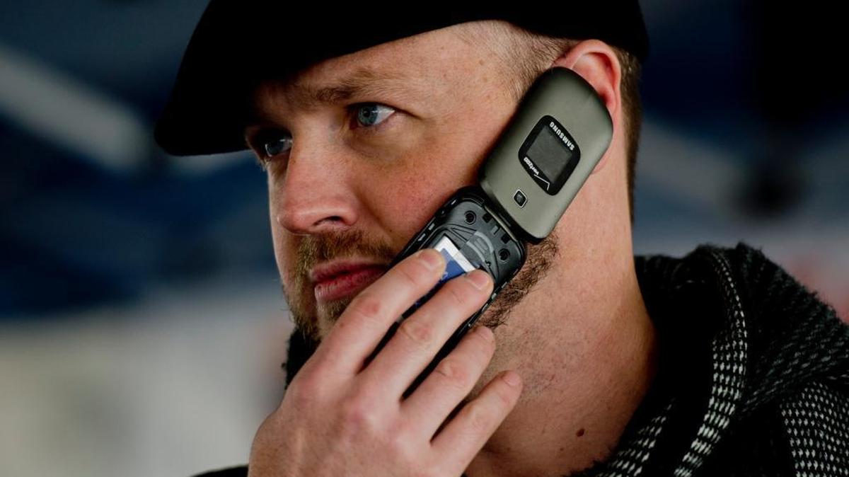 Mike Myers, 38, says he wants to talk to his parents more on the phone as his New Year’s resolution at the Farmers Market on Sun., Jan. 4, 2015 in Sacramento, Calif. Local residents may get a different area code if they seek new phone numbers starting in 2018.