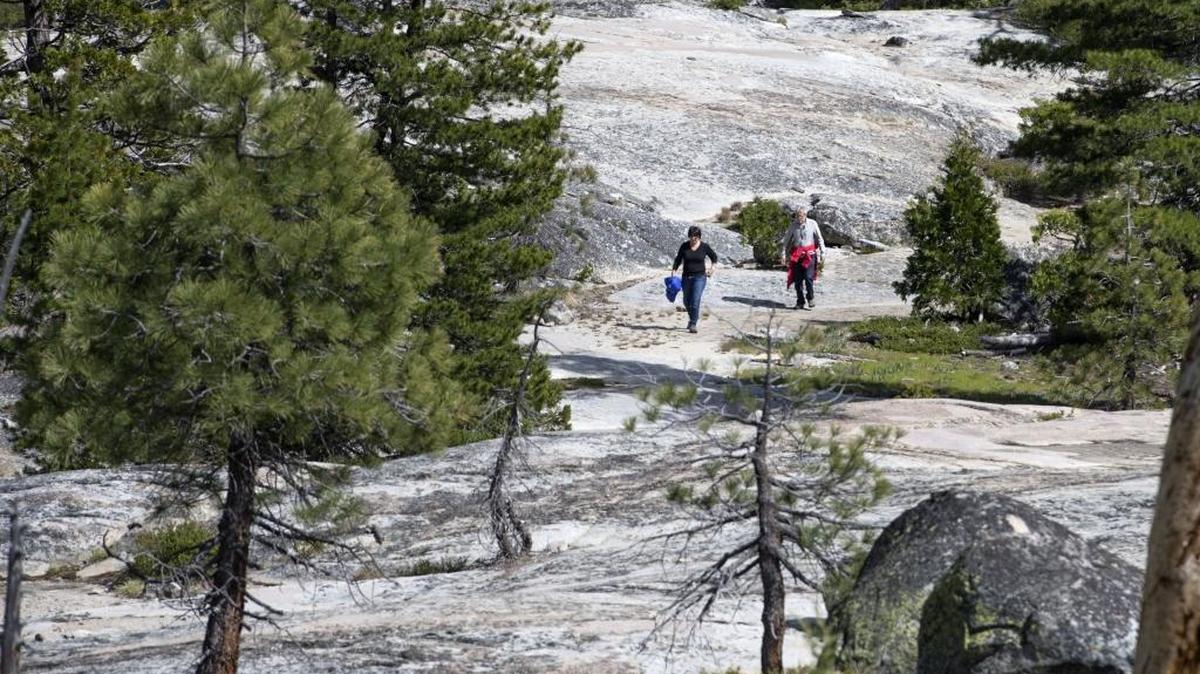Karen and Tom Worthington of Salinas hike near Pyramid Creek Loop and Horsetail Falls in 2015. Dirt roads and trails in the Eldorado National Forest that are subject to wet-weather seasonal closures reopened Saturday.