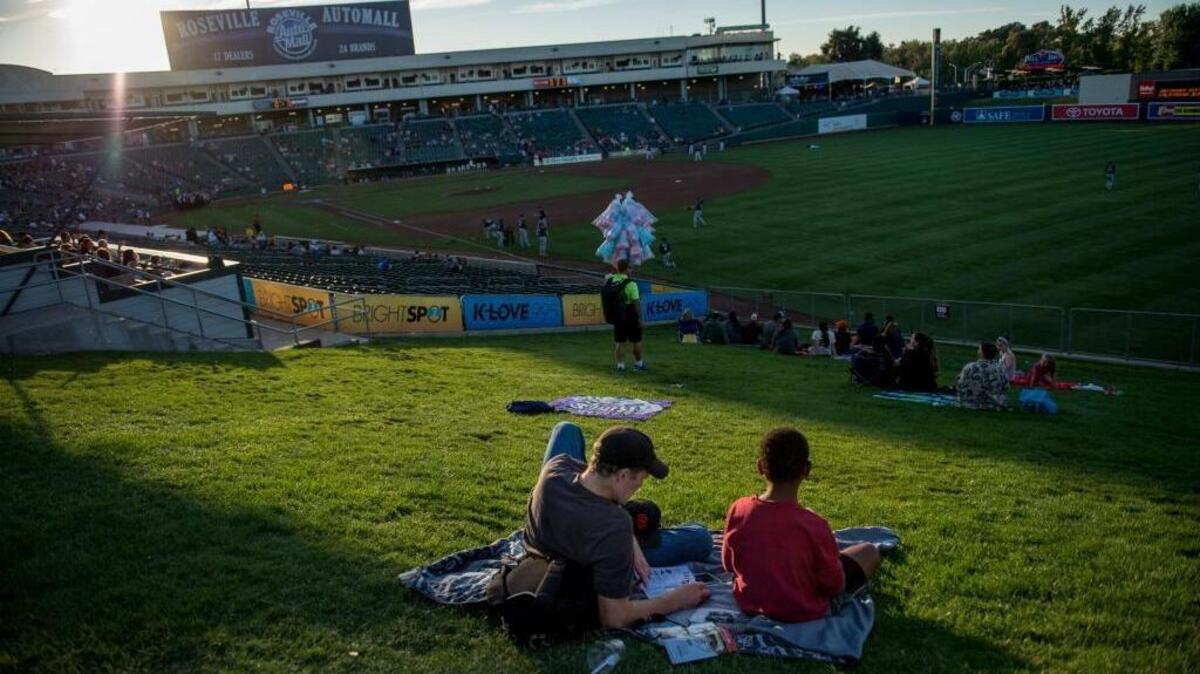 
Fans wait for the game between the Sacramento River Cats and the Reno Aces to begin at Raley Field on Wednesday, Sept. 2, 2015, in West Sacramento, Calif.
