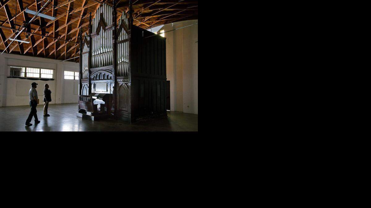 
An old pipe organ is stored at the El Dorado County Fairground in Placerville. The organ is one of the grandest and last surviving works of a Goteborg, Sweden, designer, John Bergstrom, who came to San Francisco in 1864 and manufactured dozens of exquisite pipe organs for churches before his death in 1907. Many were destroyed in the San Francisco earthquake and fires. The one in Placerville was believed to have been in the historic Placerville Federated Church for generations. But in recent decades, it’s been in storage – and disrepair – at the county fairground. Now fairground officials wants it moved – and a Rancho Cordova music professor and organ designer is advocating for its restoration and display elsewhere.
