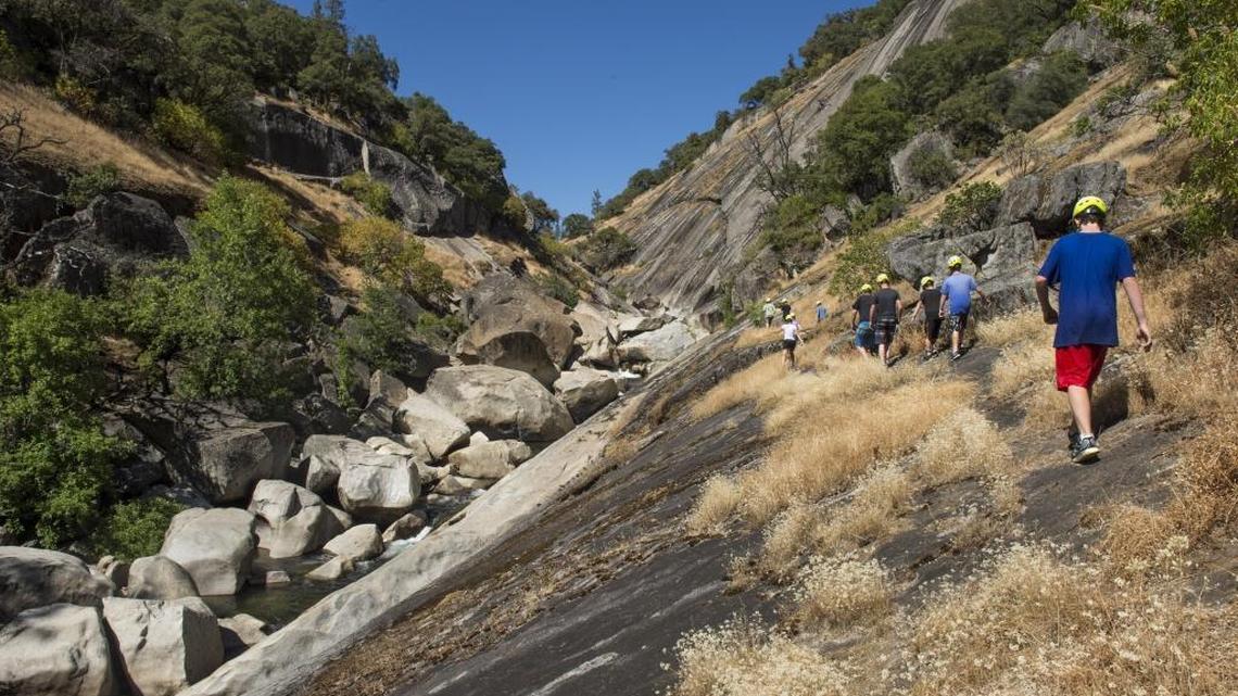 Campers are are lead by staff from the Rock-N-Water Christian Camp past the Consumes River Gorge on June 22, 2016. On May 29, a 15-year-old named Joshua Joo went missing in the same area while on a hike with his family. A local search team goes out everyday in hopes of finding the missing teen.