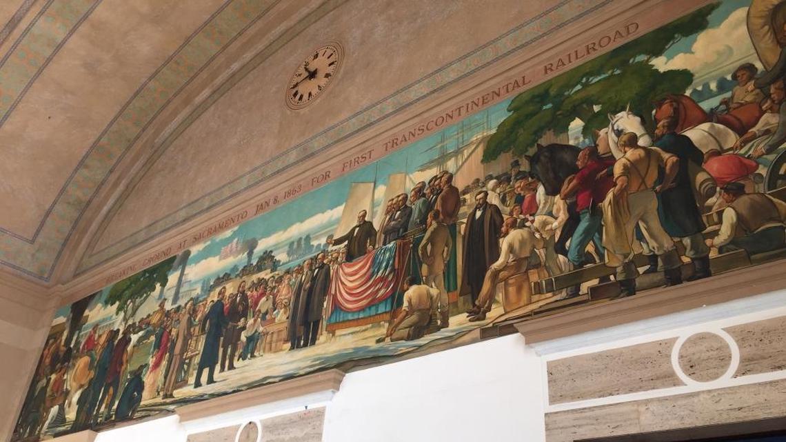 The mural depicting the launching of the transcontinental railroad, situated on the wall of the Amtrak train station, has been cleaned and touched up.