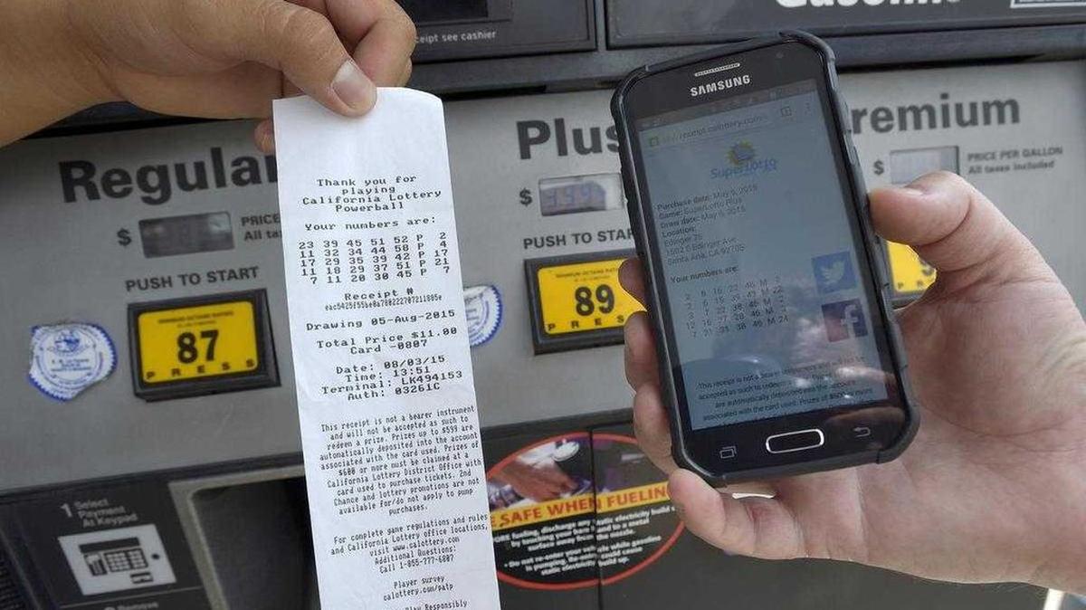 
A receipt shows lotto ticket numbers purchased at the pump at a Santa Ana gas station. The Play at the Pump program allows the lottery to market tickets to the bulk of motorists who never set foot inside gas station stores.
