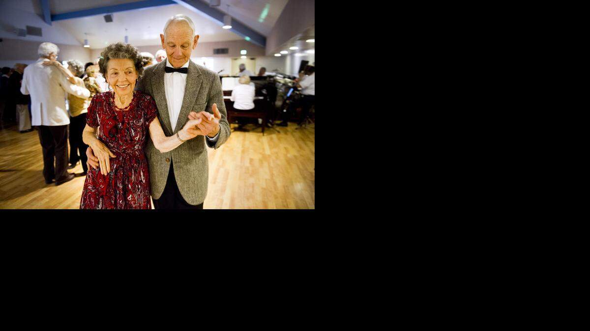 
Janie Erickson and Cliff Curtice dance together at the Mission Oaks Community Center in Carmichael. Saying she has to pay attention to the steps, Erickson calls dancing “the best thing I do.” 
