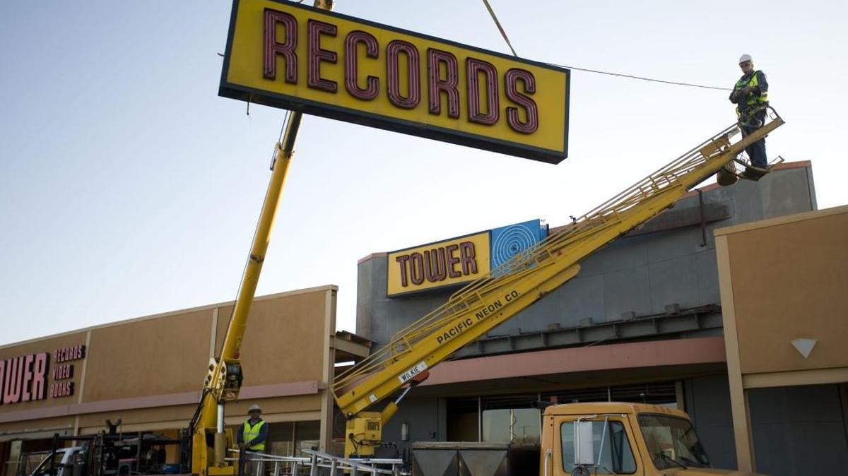 Tower Records founder Russ Solomon was on hand as the 30-foot neon sign above the first Tower Records store on Watt Avenue came down March 12, 2009. The sign was donated to the Sacramento History Museum and will hang at Golden 1 Center. The iconic site, across El Camino Avenue from Country Club Plaza, is where Solomon opened his first free-standing music store in 1960, the so-called Tower North. 