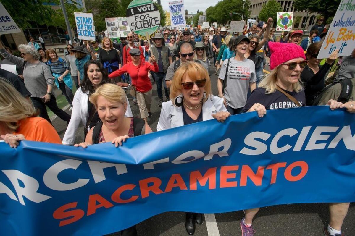 Thousands of marchers chant slogans as they proceed up Capitol Mall during the March for Science in Sacramento on Saturday.