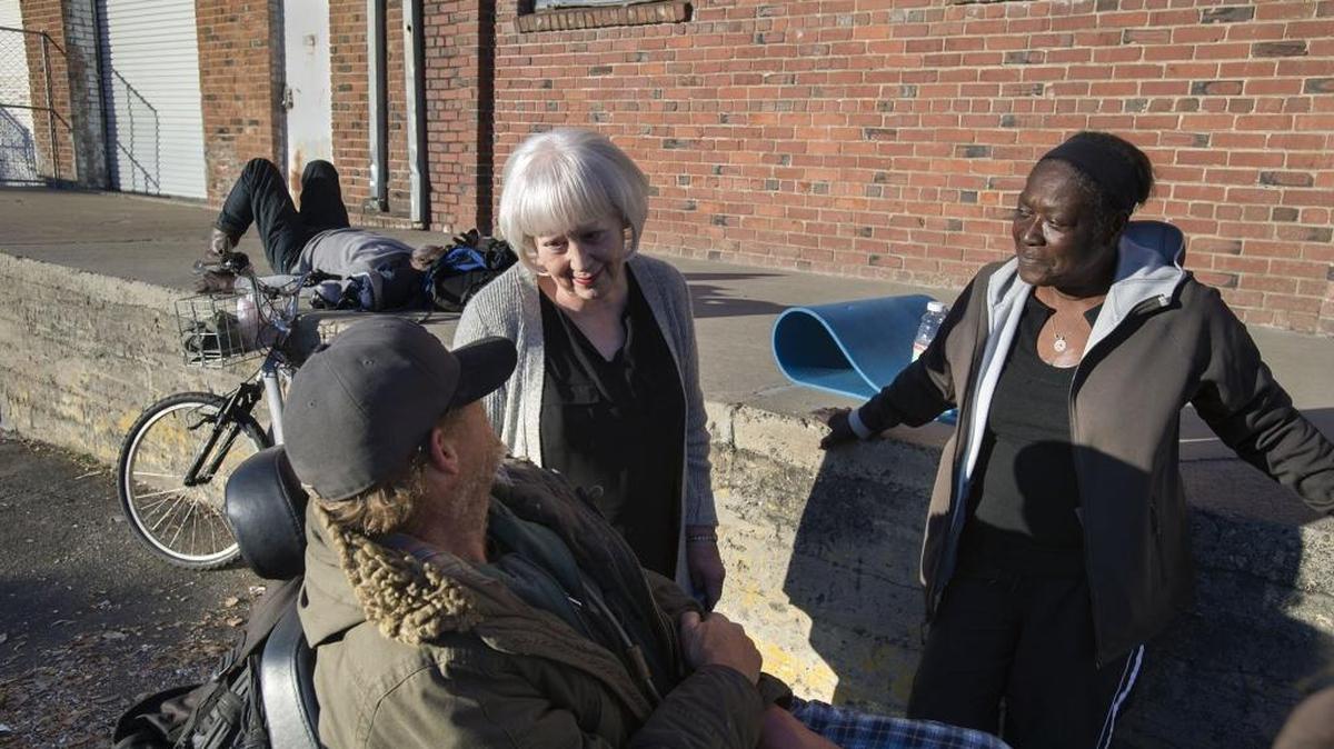 Marlene von Friederichs-Fitzwater talks to Dave Whitworth, left, and Carla Watson, who are both homeless, outside a warehouse building which she is buying on North C Street on Thursday in Sacramento. Von Friederichs-Fitzwater, a retired professor of medicine at UC Davis, plans to open a hospice for terminally ill homeless men and women at the location. Her inspiration for the project was her grandson, Joshua, who died homeless in 2014. The project, called Joshua House, is located near Loaves & Fishes and is expected to open next year.