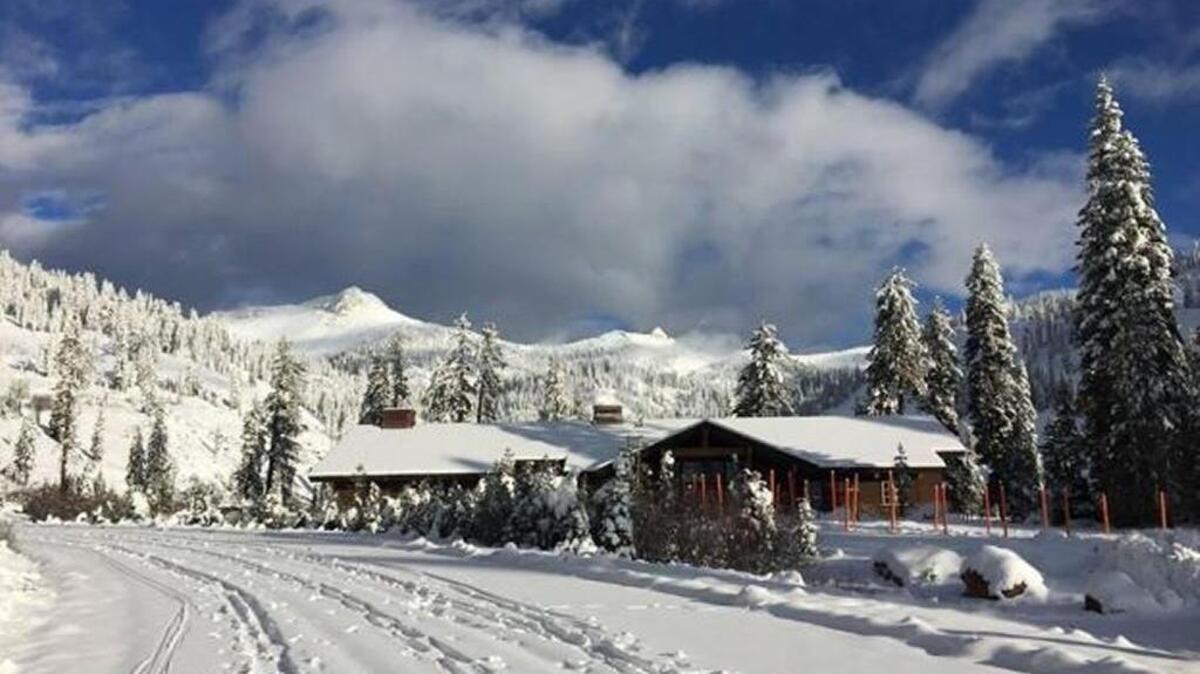 A break in the storm reveals the peaks of Lassen Volcanic National park from the Kohn Yah-mah-nee Visitor Center at the southwest entrance. Park officials Wenesday closed the road for the season.