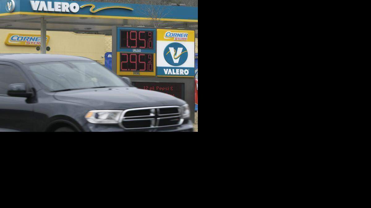 
Traffic drives past a Little Rock, Ark., Valero station advertising $1.95 regular gas Friday, Jan. 23, 2015. Retail prices are expected to rise in concert with the increasing price of crude oil.
