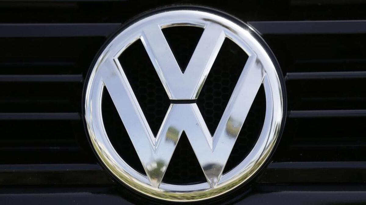 FILE - This Sept. 21, 2015, file photo, shows the Volkswagen logo on a car for sale at New Century Volkswagen dealership in Glendale.