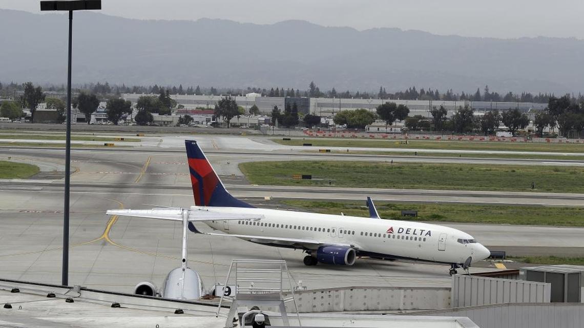 A plane taxis after landing at Mineta San Jose International Airport, Monday, April 21, 2014, in San Jose, Calif.