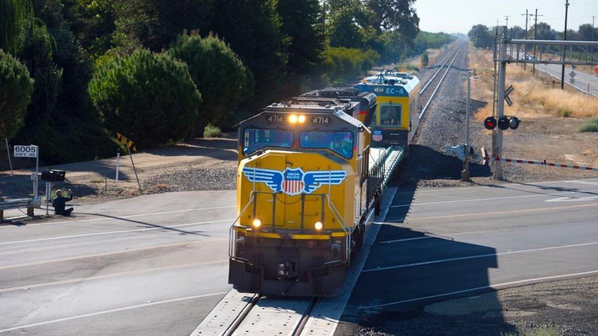A locomotive pulls Union Pacific Railroad’s EC-4 as it moves through a crossing in Yuba City on Oct. 6, 2014, in Yuba City.