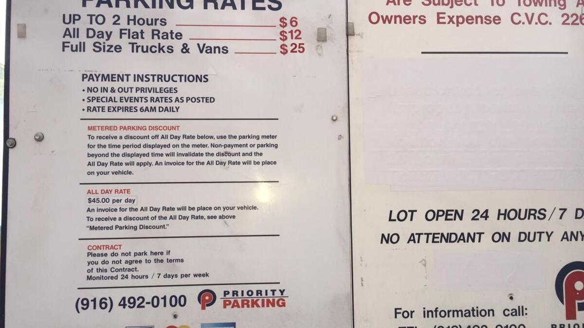 Signage posted at L Street parking lot.