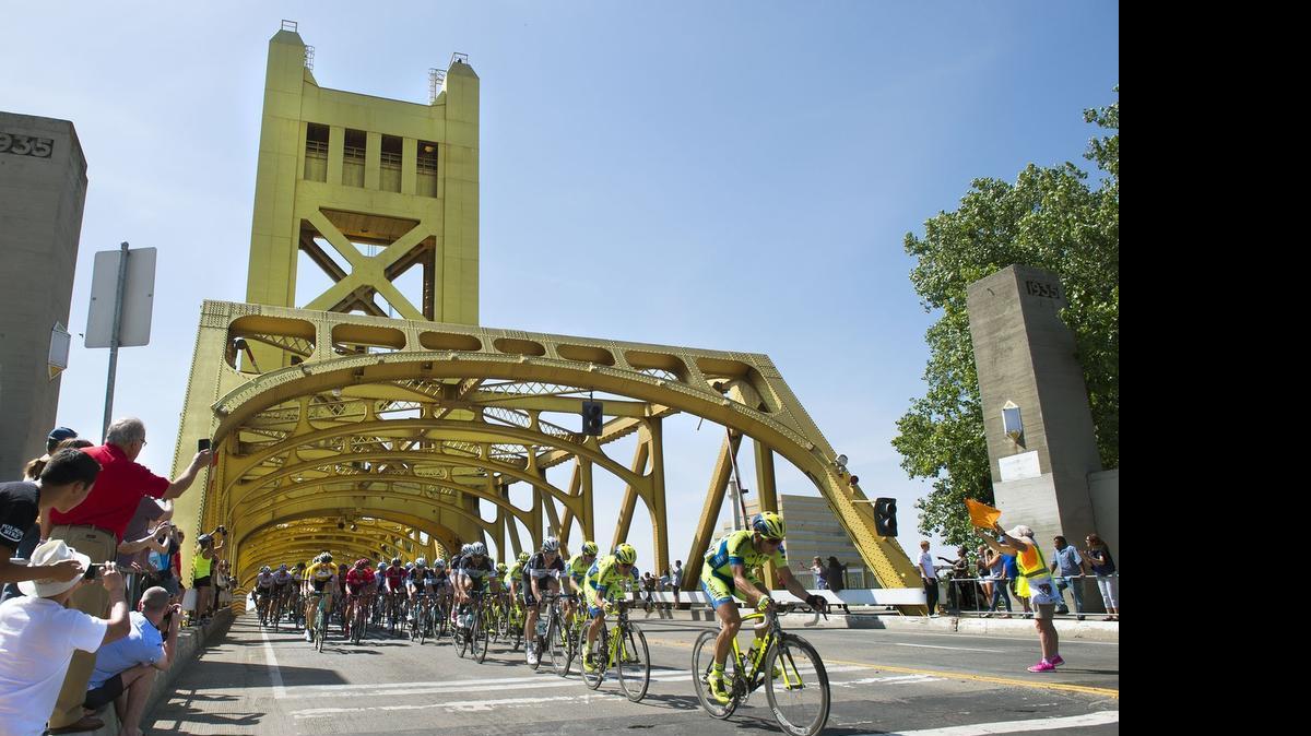 
Riders cross the Tower Bridge last month during the Tour of California. 
