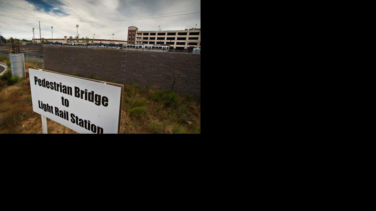 
The site for a new pedestrian bridge from Sacramento’s new Curtis Park Village development over the freight train tracks connecting to the Sacramento City College light-rail station.
