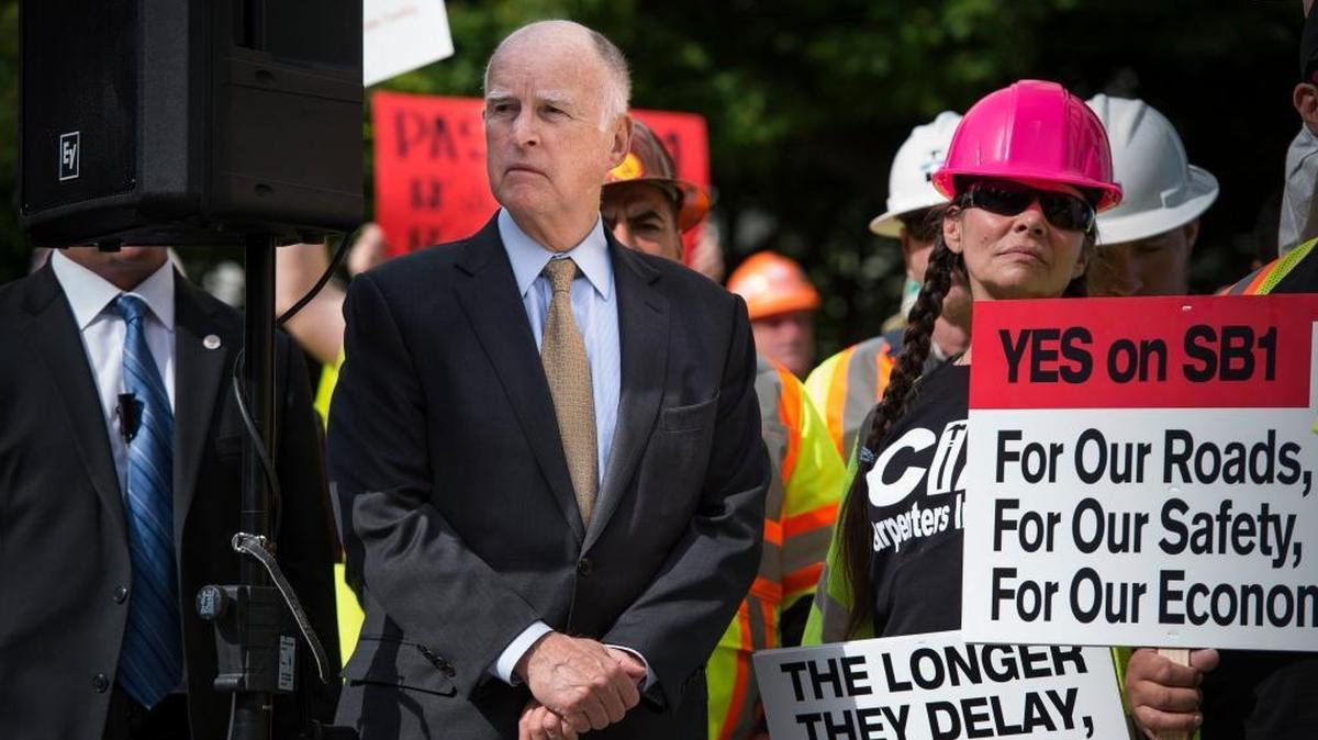 Gov. Jerry Brown joined legislators and labor leaders during a rally on the east steps of the Capitol for the Road Repair and Accountability Act of 2017, SB 1, on April 5, 2016.