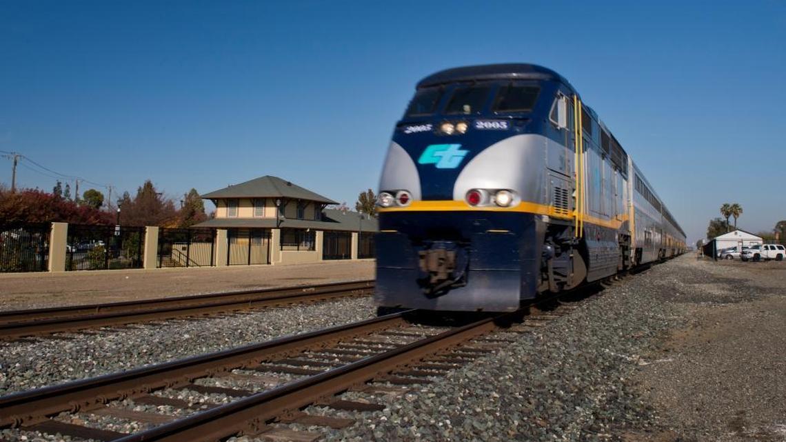 The Amtrak Capitol Corridor passenger train speeds past the downtown Dixon train “depot,” which serves as a Dixon Chamber of Commerce office in Dixon, Calif., on Tuesday, November 25, 2014. The train does not stop in Dixon.