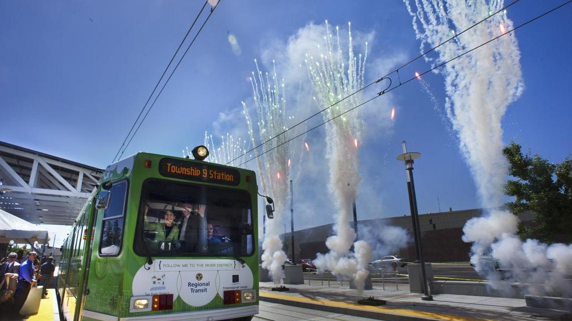 Rep. Doris Matsui, in green jacket, leads a group on the inaugural run of light rail’s Green Line to Richards Boulevard in 2012.