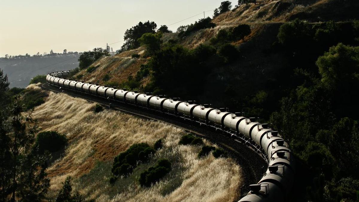 This train is a crude oil train operated by BNSF. The train is snaking its way west through James, California just outside of the Feather River Canyon in the foothills into the Sacramento Valley. Photo taken June 5, 2014 by Jake Miille
