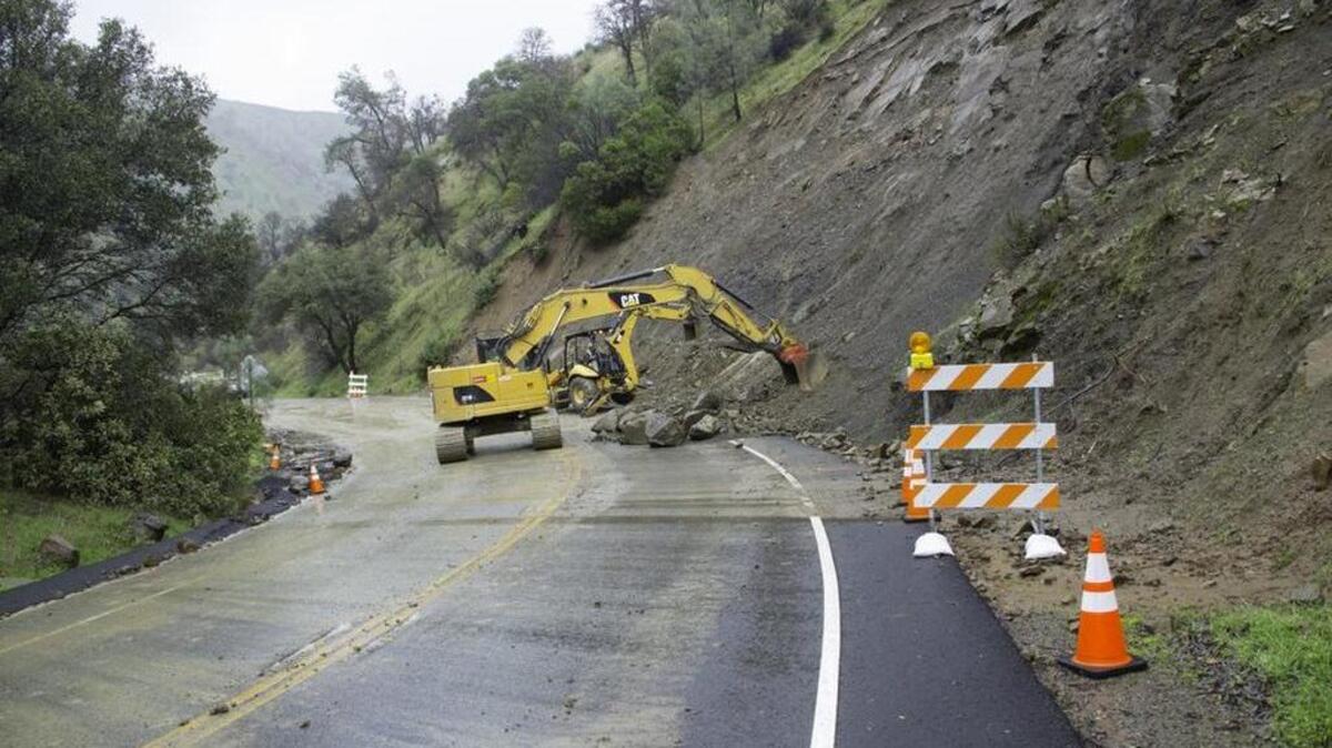 Crews repair a rockslide on Highway 128. The roadway reopened Monday.