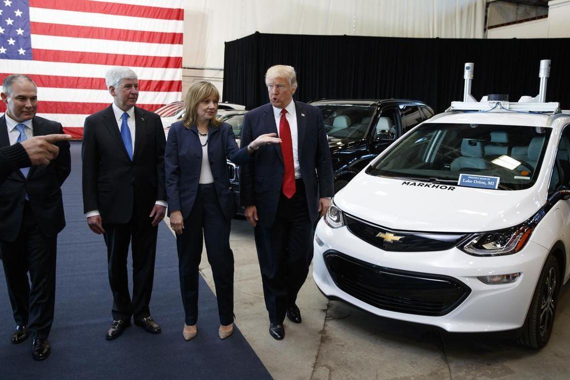 President Donald Trump tours the American Center of Mobility in suburban Detroit in March, shortly before announcing the likely rollback of greenhouse gas standards for cars. From left are, EPA Administrator Scott Pruitt, Michigan Gov. Rick Snyder, GM chief executive Mary Barra and Trump. California is already fighting Trump over the greenhouse gas rules, and this week sued his administration over delays in raising fines for carmakers that violate fuel economy mandates.