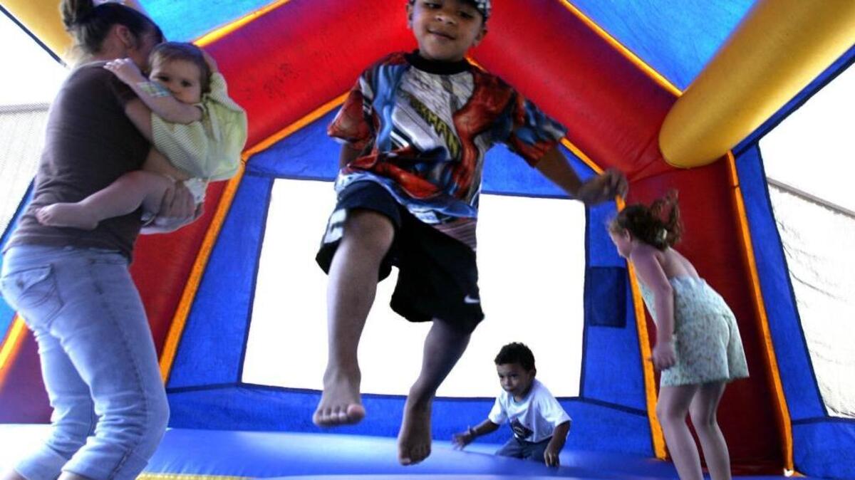 Children play in a large bounce house. The “world’s biggest bounce house” is scheduled to make a three-day stop in Sacramento from Sept. 8-10.
