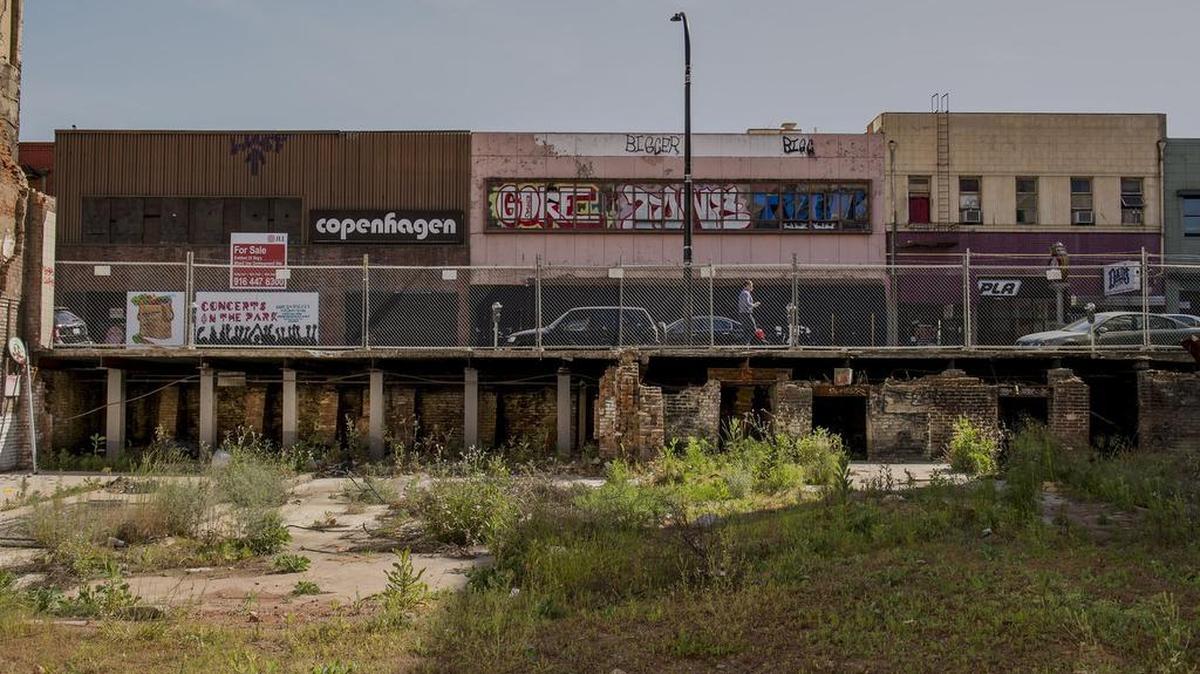 The opened tunnel running underneath the abandoned lot and buildings on J street between 10th and 11th Streets is visible on the north end of the lot on Tuesday afternoon, May 9, 2017 in Sacramento. Despite pockets of renewal in other spots of downtown, several buildings on J Street between 10th and 11th Streets sit vacant.