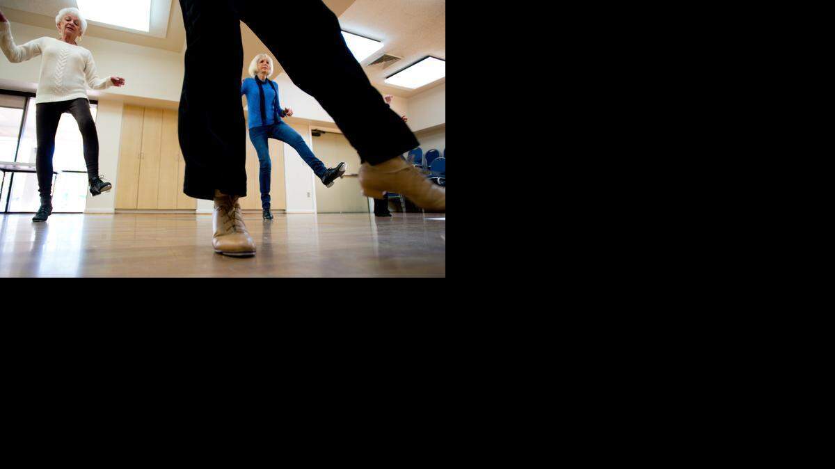 
Classy Tappers dancers Carolyn Vind, left, and Linda Warren-Pelkey practice for their performance at the Mission Oaks Community Center Monday  in Carmichael. After more than 20 years of performances together, the Classy Tappers – a tap-dancing troupe of retirement-age women who give performances at seniors communities – are calling it quits.
