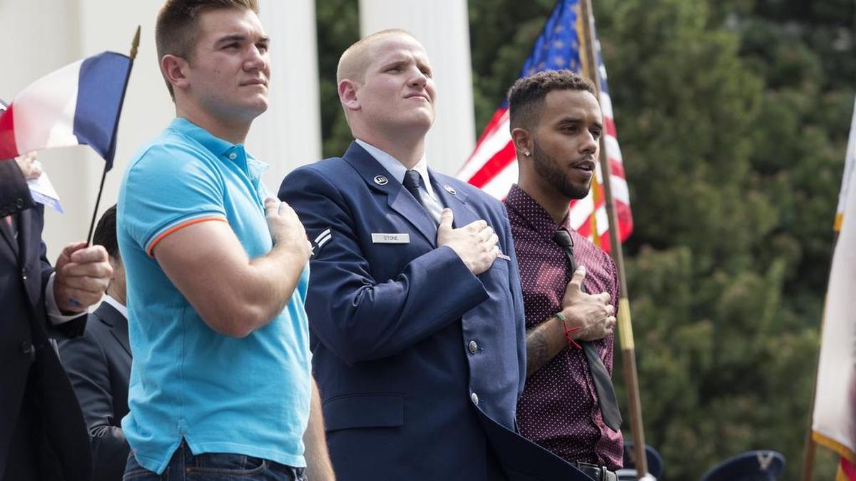 
 Alek Skarlatos, left, Spencer Stone and Anthony Sadler during the parade in Sacramento, Friday, Sept. 11, 2015.
