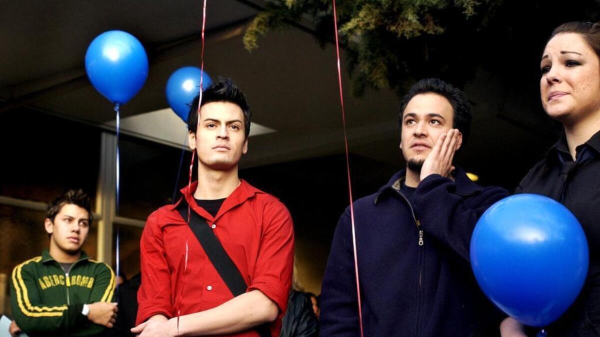 In January 2004, brothers Addam Pettit, left, and Jason Pettit right, hold a balloon release with students and community members at Del Oro High School to memorialize their murdered brother and mother. The Sacramento Chapter of Parents Of Murdered Children will host a free balloon release event in honor of loved ones claimed by violence Monday, April 11, 2016 from 11 a.m. to 1 p.m. at the International Rose Garden at Capitol Park.