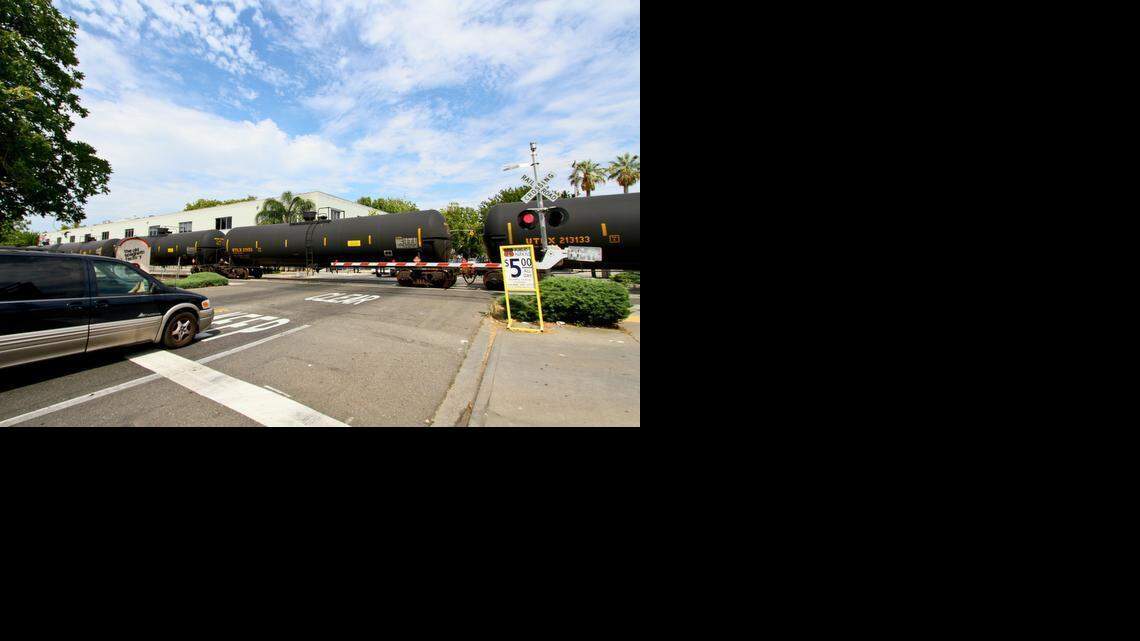 
A BNSF train carrying 98 tankers of crude oil passes through midtown Sacramento from the North Dakota Bakken oil fields to a refinery in the Bay Area city of Richmond.
